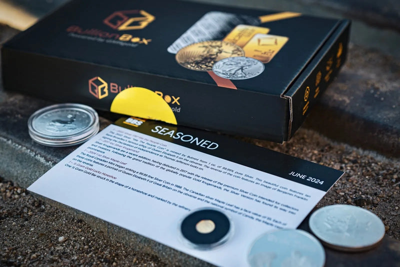 Seasoned BullionBox with info card and coins